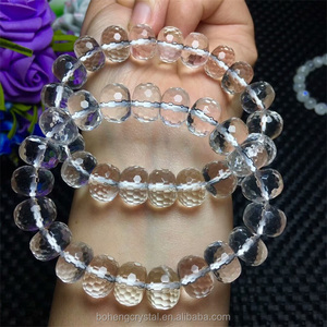 Al por mayor cristal natural 10.8-11.8mm blanco claro cristal poliedro oval pulsera de los granos - Product Image 6