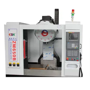 Neue Verkaufs maschine CNC China Fräsmaschinen zentrum DK650A 4. Achse Drehtisch mit vollem Maschinen gehäuse