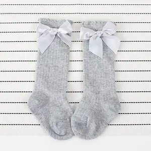 新款儿童袜子女童纯色条纹婴儿蝴蝶结棉防滑袜