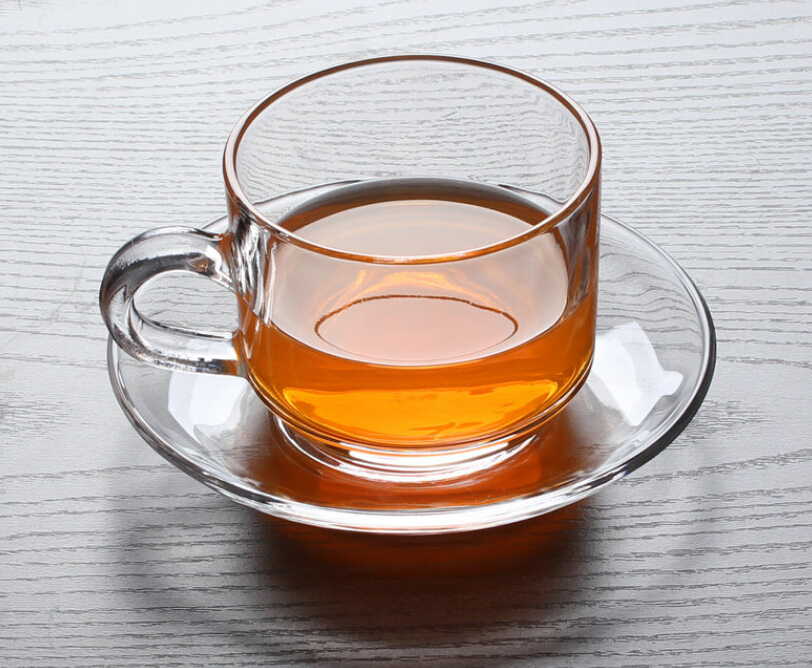 Glass coffee cup and saucer set