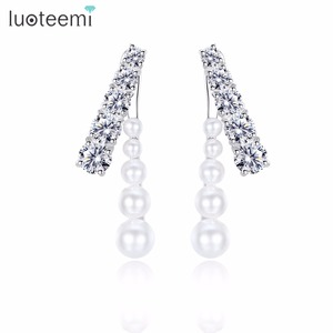 LUOTEEMI-pendientes pequeños redondos de circonia cúbica y perlas de plástico para mujer, aretes de tuerca con estilo neogótico para mujer, combinación de joyas de anillos, 2 uds. - Product Image 1