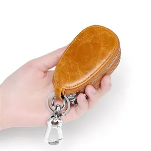 Porte-clés de voiture en cuir véritable vintage de forme ovale à 2 fermetures à glissière
