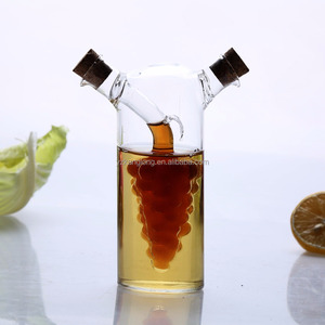 Nouveau design fait à la main en forme <span class=keywords><strong>de</strong></span> <span class=keywords><strong>raisin</strong></span> verre transparent à haute teneur en borosilicate 2 en 1 bouteille d'eau en verre d'<span class=keywords><strong>huile</strong></span> et <span class=keywords><strong>de</strong></span> vinaigre bouteille d'<span class=keywords><strong>huile</strong></span> écologique - Product Image 2
