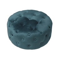 Pouf ottoman rond en tissu velours gris Bailey avec bouton