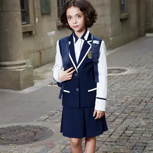 Uniformi scolastiche in stile britannico di nuovo design uniformi scolastiche elementari blu navy con logo personalizzato economico