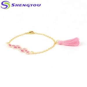 Estilo del verano diferentes colores pulsera de semillas de borla para niñas - Product Image 1