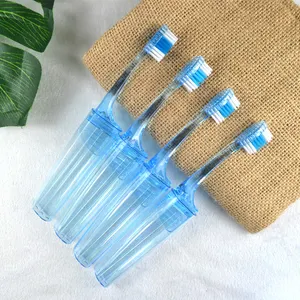 青い透明な折りたたみ式歯ブラシ