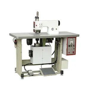 Double head ultrasonic-controlled handle loop fixing/bag making machine