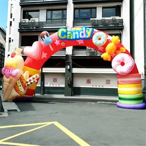 户外圣诞充气糖果甘蔗甜甜圈拱门与蝴蝶结和事件装饰与礼品在广告充气