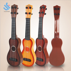YF-C0105 Prima educazione intelligente di alta qualità per bambini strumento musicale <span class=keywords><strong>mini</strong></span> quattro dazzle chitarra giocattoli - Product Image 1