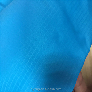 Venta caliente suave delgada 0.2 cm ripstop 100% nylon 40D tafetán tela impermeable para ropa protectora - Product Image 4
