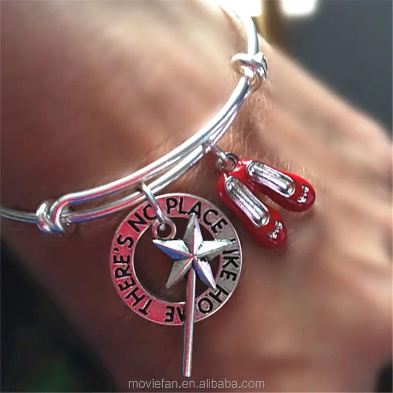 The wizard of Oz bracelet with wand or red shoes and stamped There's no place like home charms