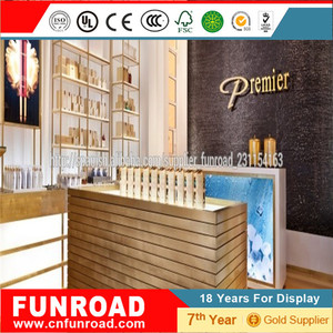 Mostradores expositivos escaparate de pared para tiendas cosmeticas con <span class=keywords><strong>vitrina</strong></span> central y modulos de pared de estilo <span class=keywords><strong>elegante</strong></span> - Product Image 4