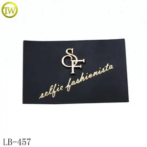 Wholesale cheap jeans label design gold metal name leather patch for bags