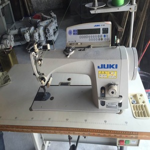 Juki-DDL 9000B-SH utilizzato industriale computerizzata automatica macchina da cucire a punto annodato