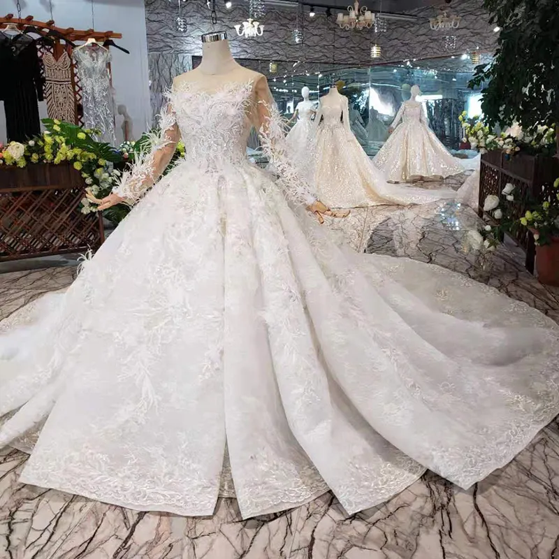 HTL318-vestidos de novia especiales con plumas transparentes en la espalda, vestido de novia hecho a mano con botones para niña, vestido de novia para niña