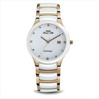 Montres fantaisie pour femme avec bracelet en métal quartz