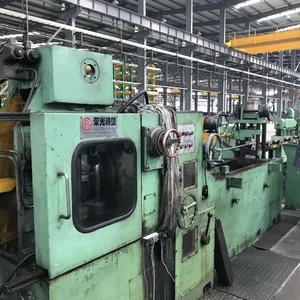 Metal yuvarlak çelik çubuk Cnc Merkezsiz Torna Soyma Makinesi fabrika