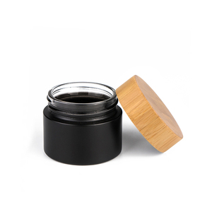 Custom made lozione contenitore 30 <span class=keywords><strong>ml</strong></span> 50 <span class=keywords><strong>ml</strong></span> <span class=keywords><strong>100</strong></span> <span class=keywords><strong>ml</strong></span> di bambù imballaggio cosmetico crema per il viso nero vasetti di vetro con bambù coperchio di legno - Product Image 1