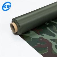 Tissu tricoté en PVC camouflage vert imperméable et résistant à l'huile, respirant et indéchirable pour pantalons de travail d'extérieur