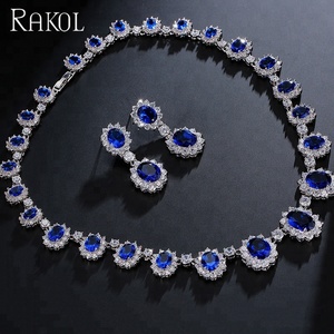 RAKOL SP018 Juego de Joyería de Lujo con Collar y Aretes con Cristales Redondos Grandes de Circonita Cúbica, Bañado en Rodio, con Forma de Flor de <span class=keywords><strong>Mona</strong></span> Lisa, para Regalo - Product Image 1