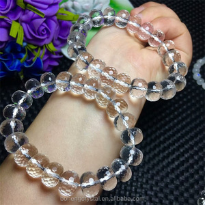 Al por mayor cristal natural 10.8-11.8mm blanco claro cristal poliedro oval pulsera de los granos - Product Image 3
