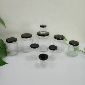 批发不同尺寸的带有黑色金属盖的六角形透明蜂蜜玻璃瓶 - Product Image 4
