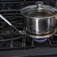 Qualité alimentaire Réutilisable 410 # En Acier Inoxydable Diffuseur De Chaleur Pare Flamme Plaque de Mijotage Cuisinière À Gaz Outil avec Poignée En Plastique