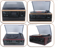 Centre musical tout-en-un, gramophone, lecteur de disques vinyles, platine avec lecture et enregistrement USB/SD, cassette, lecteur de CD et radio analogique AM/FM