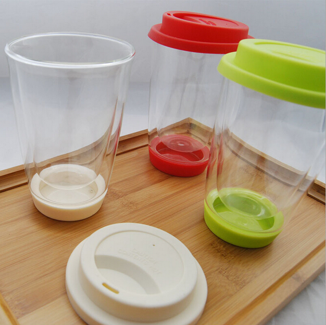 Double wall glass coffee cup with silicone base and lid