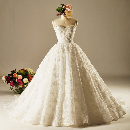 Diseños Elegantes para Tu Día Perfecto: vestido de novia de encaje