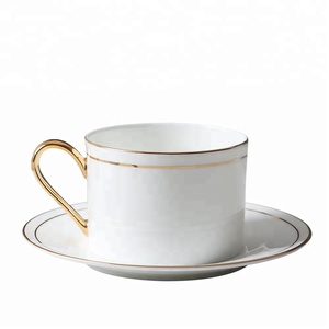Juego de taza y platillo de té y café de cerámica blanca reutilizable de porcelana de postre de calidad superior para servir té y café - Product Image 6