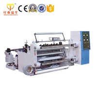 Machine à découper et à rembobiner les rouleaux de bâche en PVC à double station