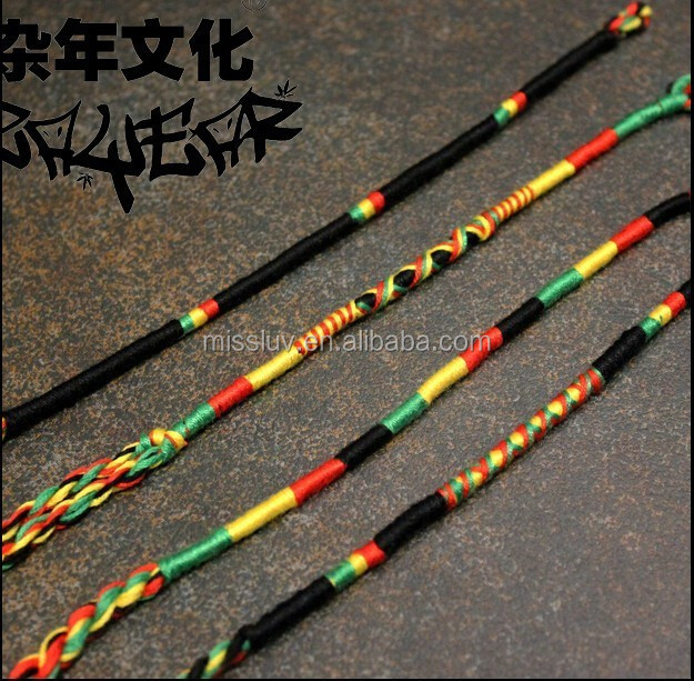 Fashion buatan tangan desain reggae Jamaica gelang tenun rasta hitam merah kuning hijau katun tali gelang anyaman tangan