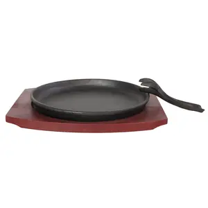 Padella sizzler fajita rotonda in ghisa di vendita calda di olio vegetale con piastra in legno