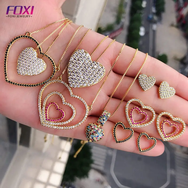 body jewelry sets display gold plated sparkle cz diamonds heart shaped earring pendant necklace