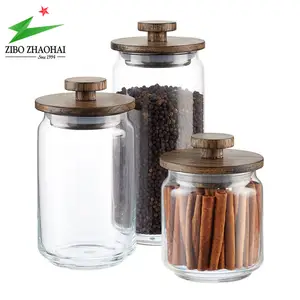 Wholesale Creative Use Of Glass Tea Canister Round Food Sealed Canister Glass Canisters with Walnut Lids