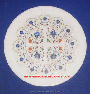 Plat en marbre blanc de conception créative et magnifique, de forme ronde, avec incrustations multicolores, utilisé pour la décoration d'hôtels et de mariages - Product Image 1