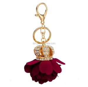 Llavero personalizado con diseño de moda, corona superior roja, rosa de PU, venta al por mayor