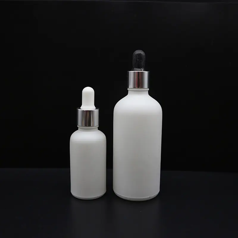 Wholesale elegant matte frosted white 30ml 50ml glass dropper bottle with golden silver aluminum pipette cap