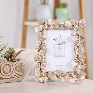 Cadre photo de bureau en résine européenne feuilles dorées pour la décoration de mariage