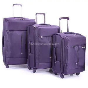 紫色休闲旋转器旅行箱包 20 24 28 可扩展轮式滚动手提箱