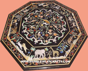 Mesa decorativa negra con incrustaciones - Product Image 1