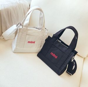 <span class=keywords><strong>Sac</strong></span> à main en toile avec poignée en <span class=keywords><strong>cuir</strong></span>, prix bas, tendance, <span class=keywords><strong>sac</strong></span> fourre-tout pour femmes, avec bandoulière, sacs de voyage, logo personnalisé - Product Image 2