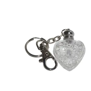 Heart shape hanging decorative glass perfume bottles with keychain lida