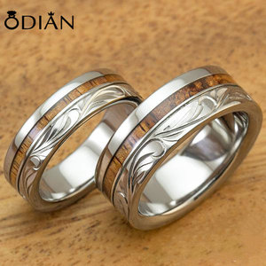 Set di Anelli Nuziali in Titanio <span class=keywords><strong>con</strong></span> Intarsio in Legno Inciso a Mano <span class=keywords><strong>con</strong></span> Design di Figure Tradizionali per Uomo - Product Image 4