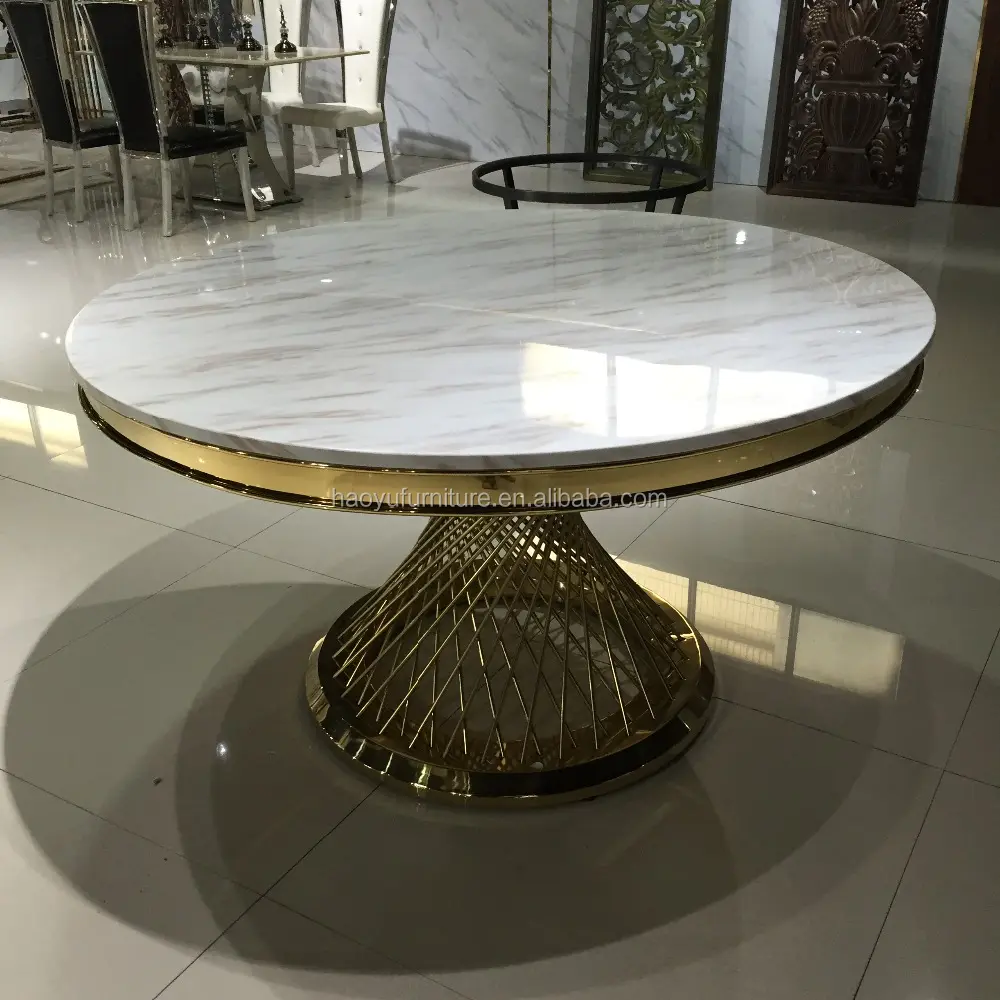 Il tavolo da pranzo in acciaio inossidabile disegna un tavolo da pranzo rotondo in acciaio inossidabile dorato con marmo