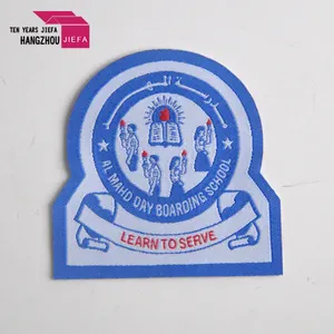 O logotipo personalizado da marca do preço da fábrica em ferro tecido no patches para roupas