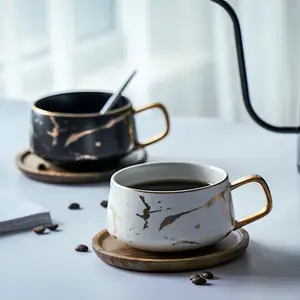 批发金柄大理石陶瓷茶杯，带木碟