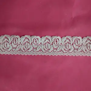 Ivory Color Stretch Lace Swiss voile Lace Trim marketed in Dubai